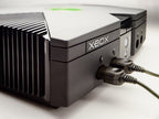 Konsole schwarz + Original Controller D + Zubehör