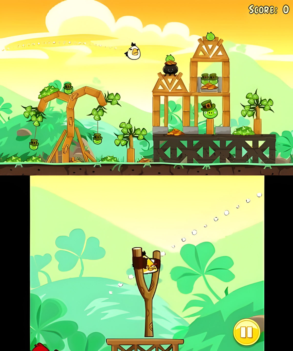In Angry Birds Trilogy zielt ein gelber Vogel in der Schleuder auf grüne Schweine in Holzkonstruktionen.