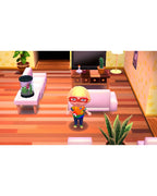 Eine Spielfigur steht im Wohnzimmer in Animal Crossing: New Leaf - Welcome amiibo.