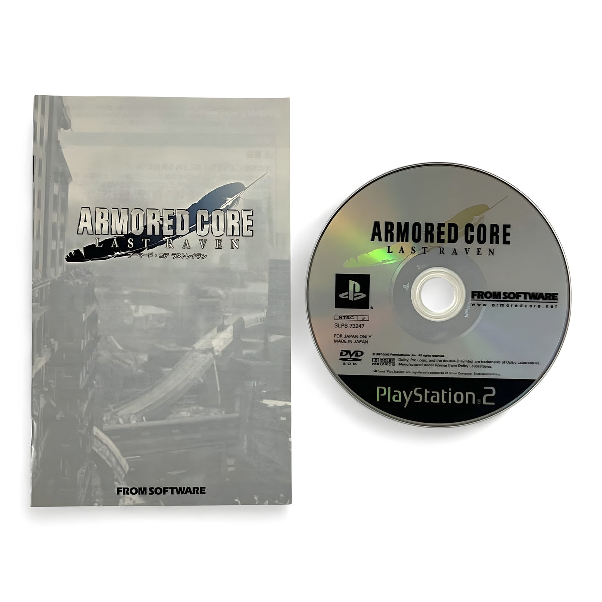 Die Anleitung und die Disc von Armored Core: Last Raven für PS2 liegen nebeneinander auf weißem Grund.