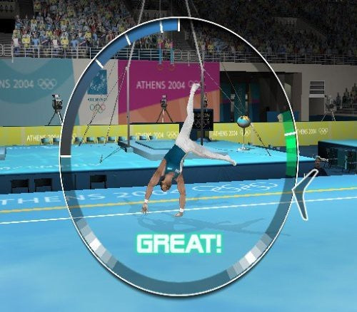 Ein Turner an den Ringen vollführt einen Handstand, während ein Kreis mit der Aufschrift 'GREAT!' eingeblendet ist.