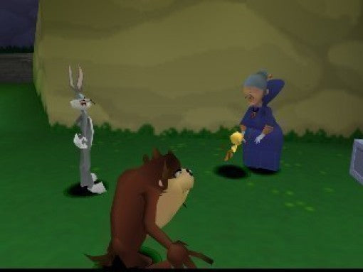Bugs Bunny, Taz und Granny stehen auf einer grünen Wiese, Granny hält etwas Gelbes in der Hand.