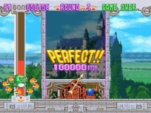 Der Game-Over-Bildschirm zeigt die Meldung „PERFECT!! 100000 PTS!!“ und den grünen Drachen Bub unten links.