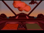 Blick aus einem Cockpit auf eine große rote Explosion am Himmel über einer rötlichen Landschaft.