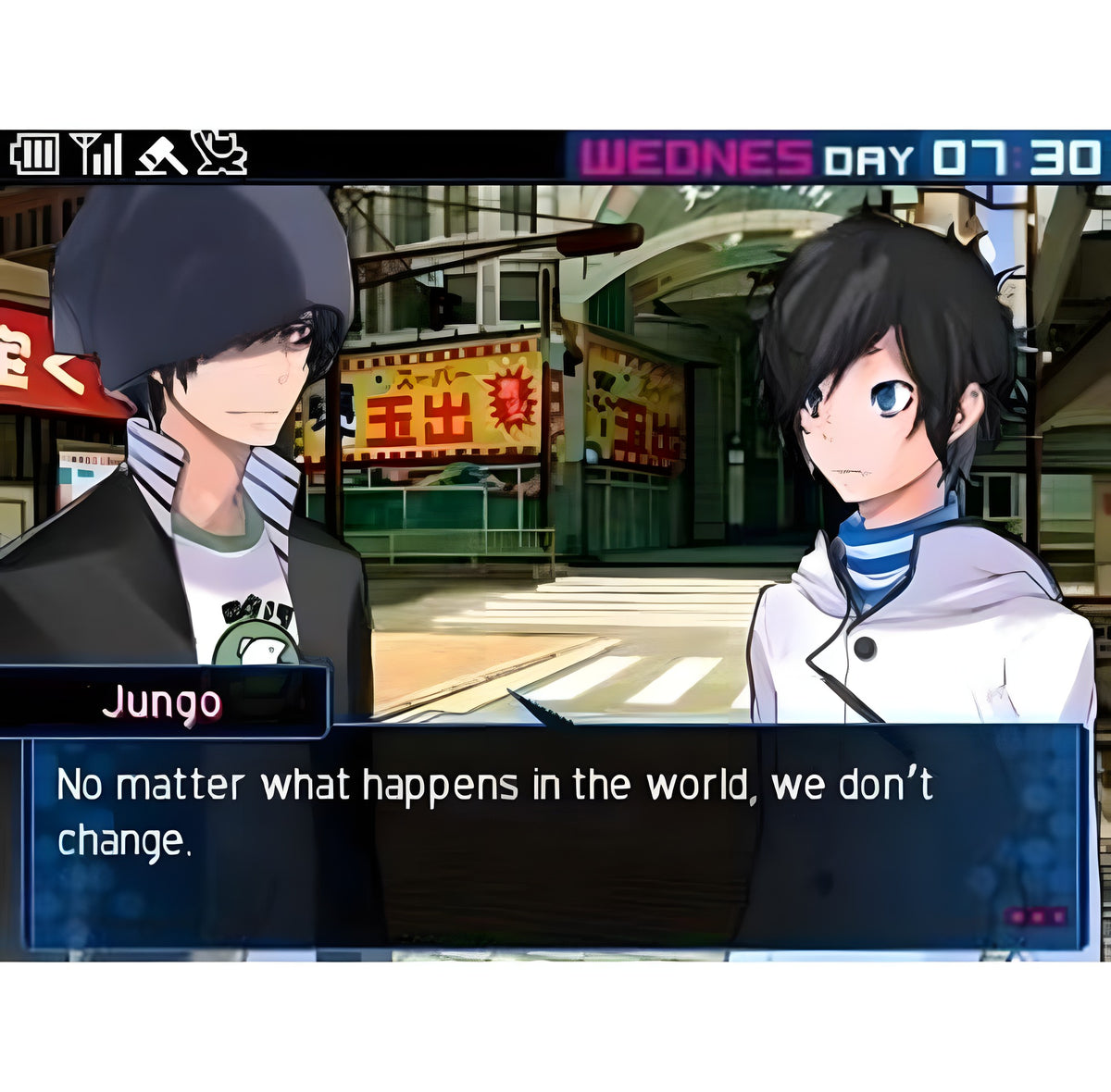 Jungo spricht in Devil Survivor 2: Record Breaker, während ein anderer Charakter zuhört.