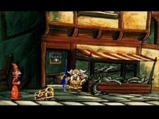 Zwei Charaktere stehen in Discworld 1 vor einem Geschäft mit einem "Photo"-Schild.