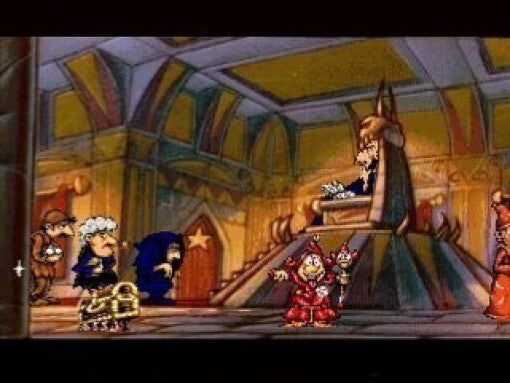 Eine Thronszene aus Discworld 1 zeigt mehrere Charaktere vor einem sitzenden Herrscher.