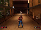 Duke Nukem im Cowboy-Outfit steht auf einer staubigen Straße in einer Westernstadt und zielt auf einen Gegner.