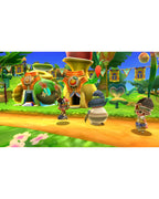 Drei Figuren stehen in Ever Oasis für Nintendo 3DS in einem farbenfrohen Dorf mit runden Häusern.