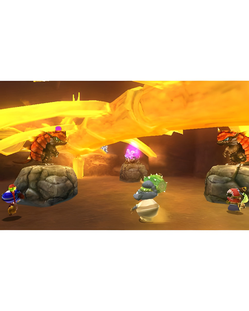 In Ever Oasis für Nintendo 3DS kämpfen kleine Figuren in einer Höhle gegen zwei große, drachenähnliche Gegner.