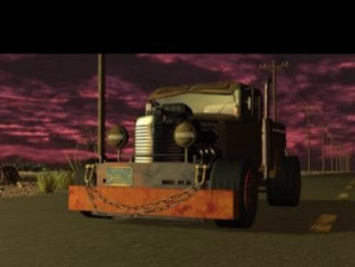 Ein großer, rostiger Truck mit Ketten an der Front fährt auf einer Straße unter einem roten Himmel.