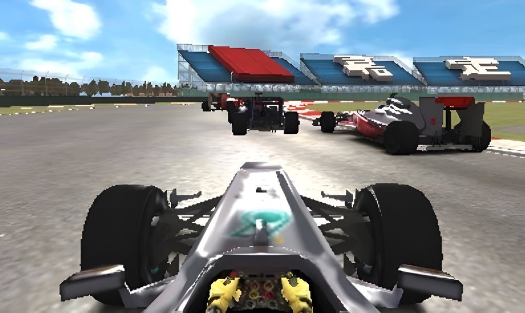 Eine Verfolger-Perspektive in F1 2011 zeigt den eigenen Wagen und zwei Konkurrenten.
