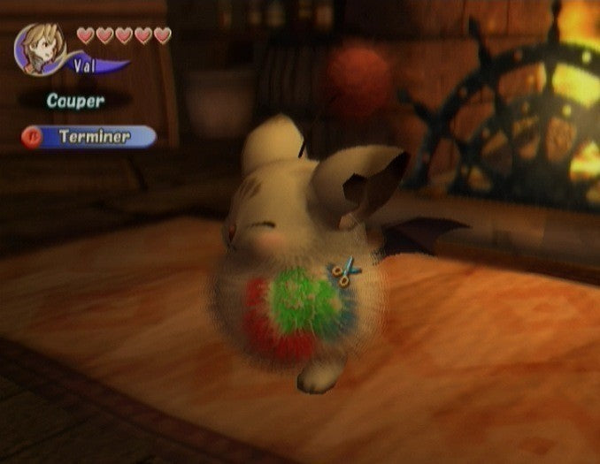 Ein Moogle mit kleinen Flügeln sitzt auf einem Tisch, während ein Spieler Wolle von ihm schneidet.