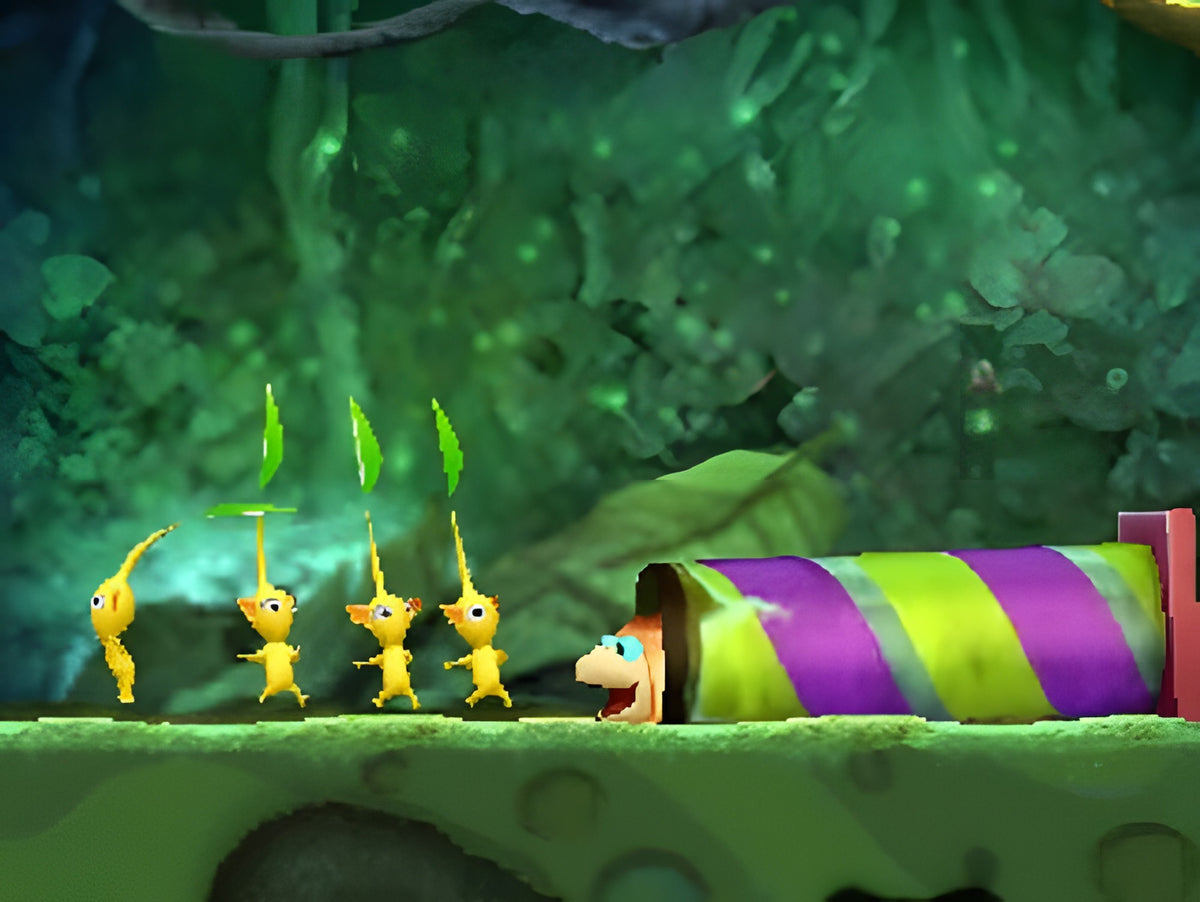 In Hey! Pikmin laufen vier gelbe Pikmin vor einem bunten Rohr, aus dem ein Wesen schaut.
