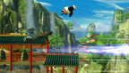 Po fliegt in Kung Fu Panda: Showdown der Legenden über eine Berglandschaft mit Tempeln.