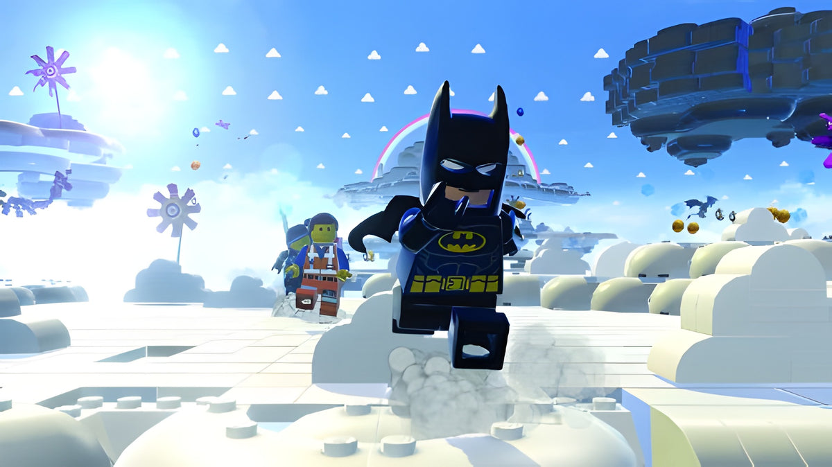 In LEGO The Movie: Videogame rennt Batman durch eine helle Wolkenwelt mit Regenbogen.