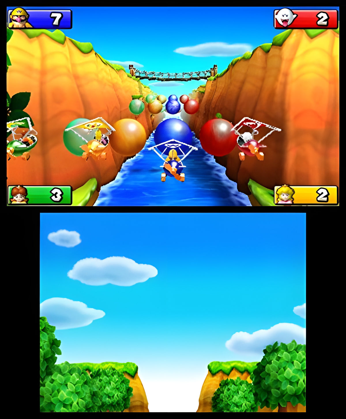 Mehrere Charaktere gleiten in Mario Party: Island Tour mit Drachen über einen Fluss in einer Schlucht.