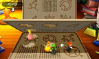 Eine Spielszene aus Mario Party: The Top 100 für Nintendo 3DS zeigt Charaktere auf den Seiten eines großen Buches.