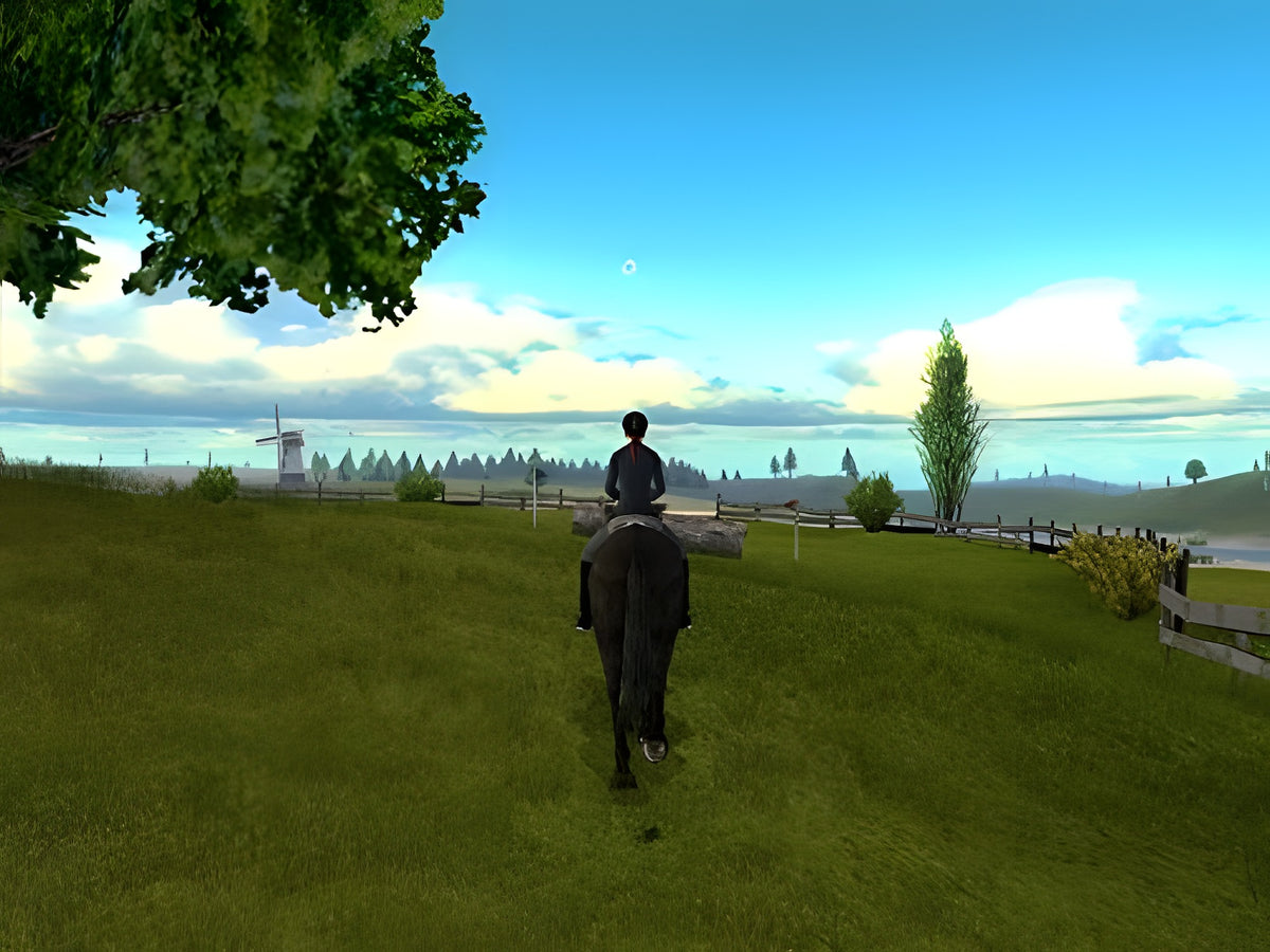 In Mein Gestüt 3D: Ein Leben für die Pferde reitet eine Person auf einem Pferd durch eine weite Landschaft mit Windmühle.