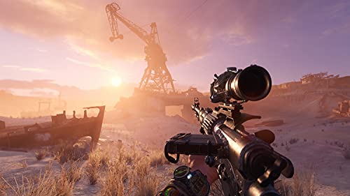 Eine Wüstenlandschaft mit einem großen Kran ist in Metro Exodus Complete Edition zu sehen.