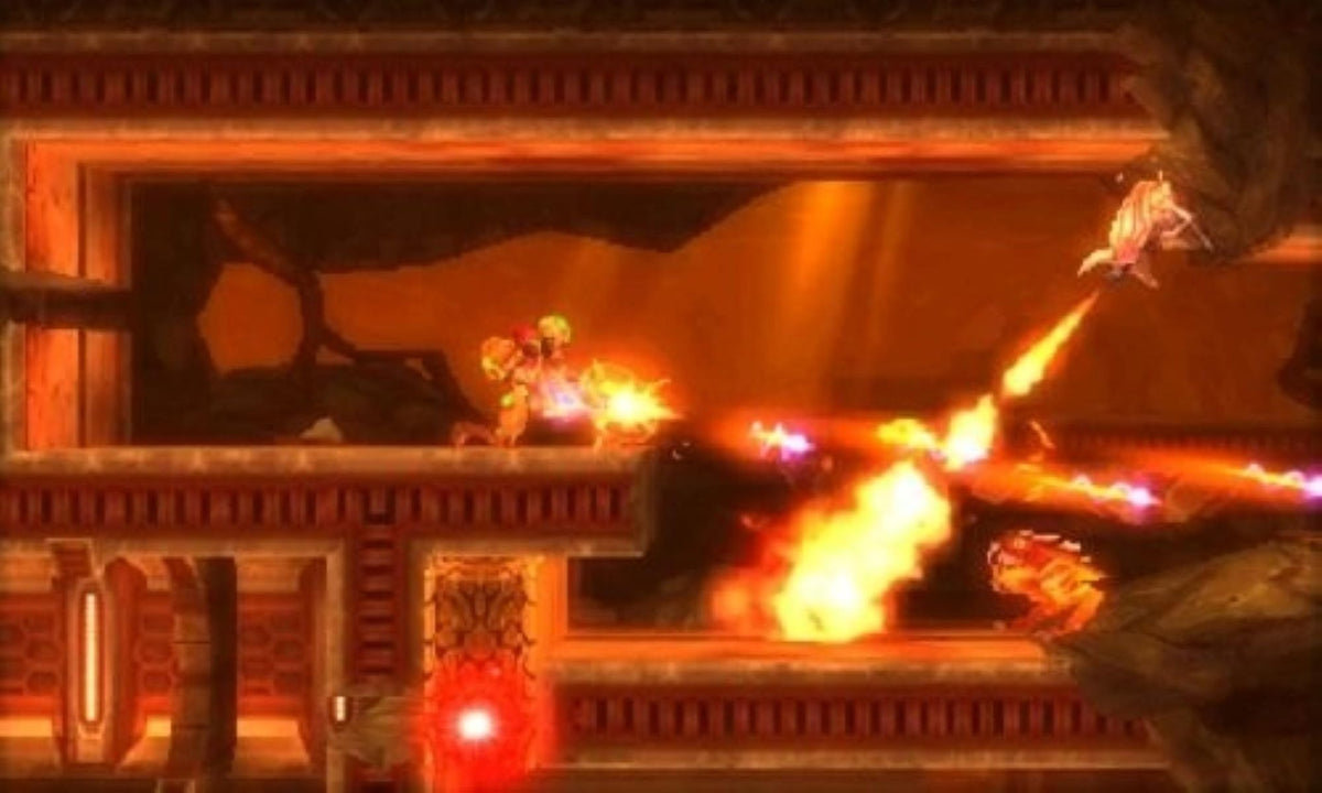Metroid: Samus Returns zeigt Samus Aran, die in einer Lavahöhle auf mehrere Gegner schießt.