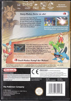 Die Rückseite der Spielhülle von Pokémon Colosseum mit Screenshots und Texten zur Story des Spiels.