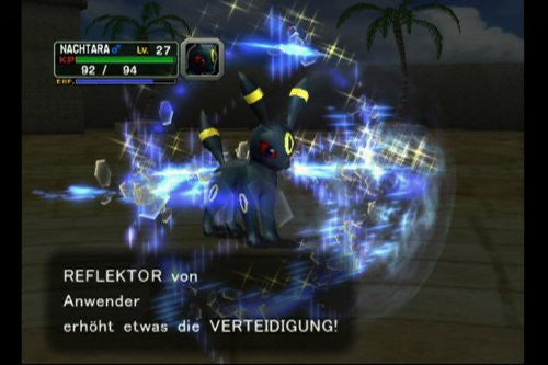 Ein Screenshot aus Pokémon Colosseum zeigt das Pokémon Nachtara im Kampf, umgeben von blauen Lichteffekten.
