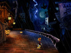 Rayman M für PS2 zeigt Rayman auf einer Holzbrücke bei Nacht, während es regnet und blitzt.