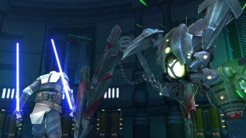 Eine Spielfigur mit zwei Lichtschwertern steht einem großen, grünen Roboter gegenüber.