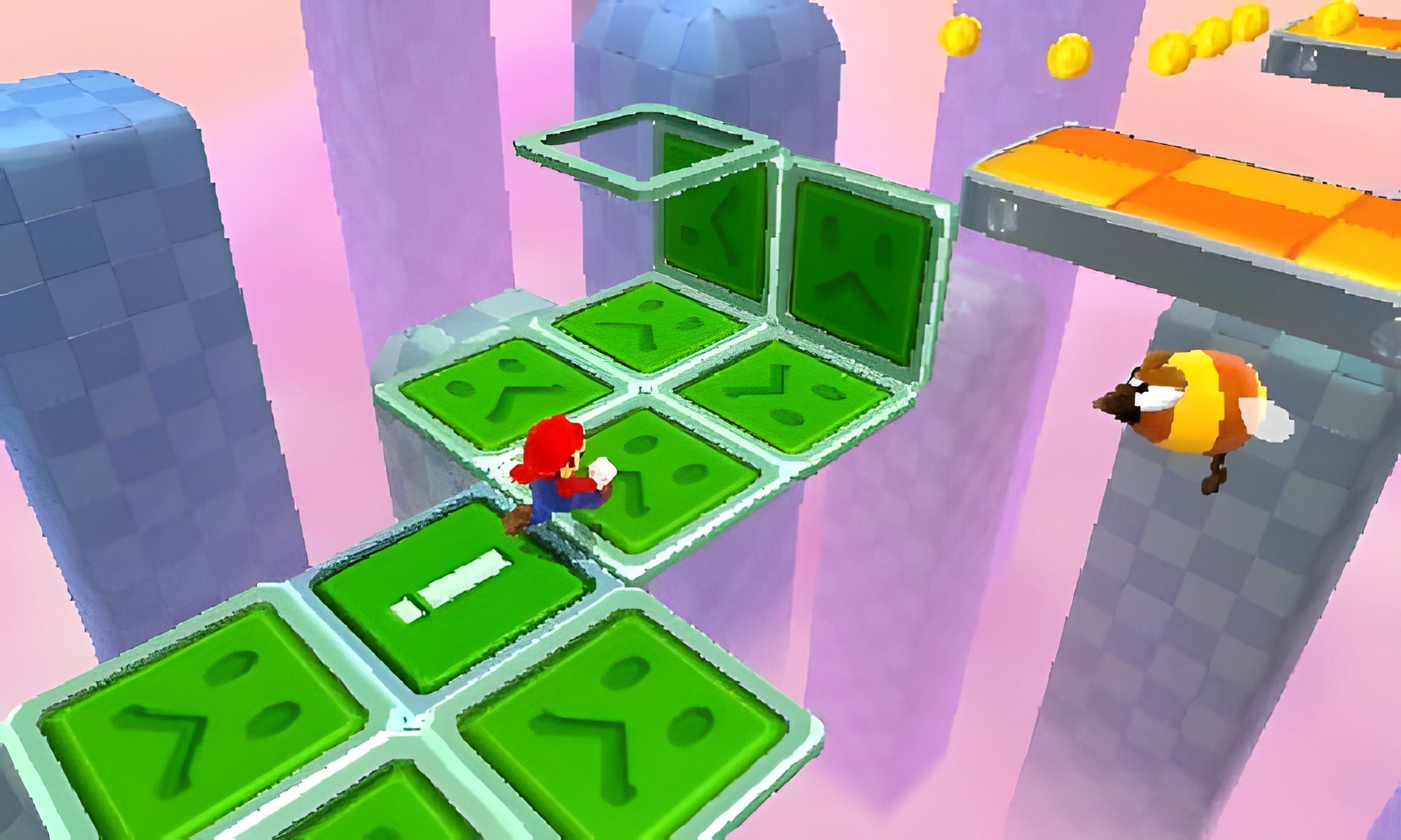 Super Mario 3D Land zeigt Mario auf grünen Plattformen, während eine Biene vorbeifliegt.