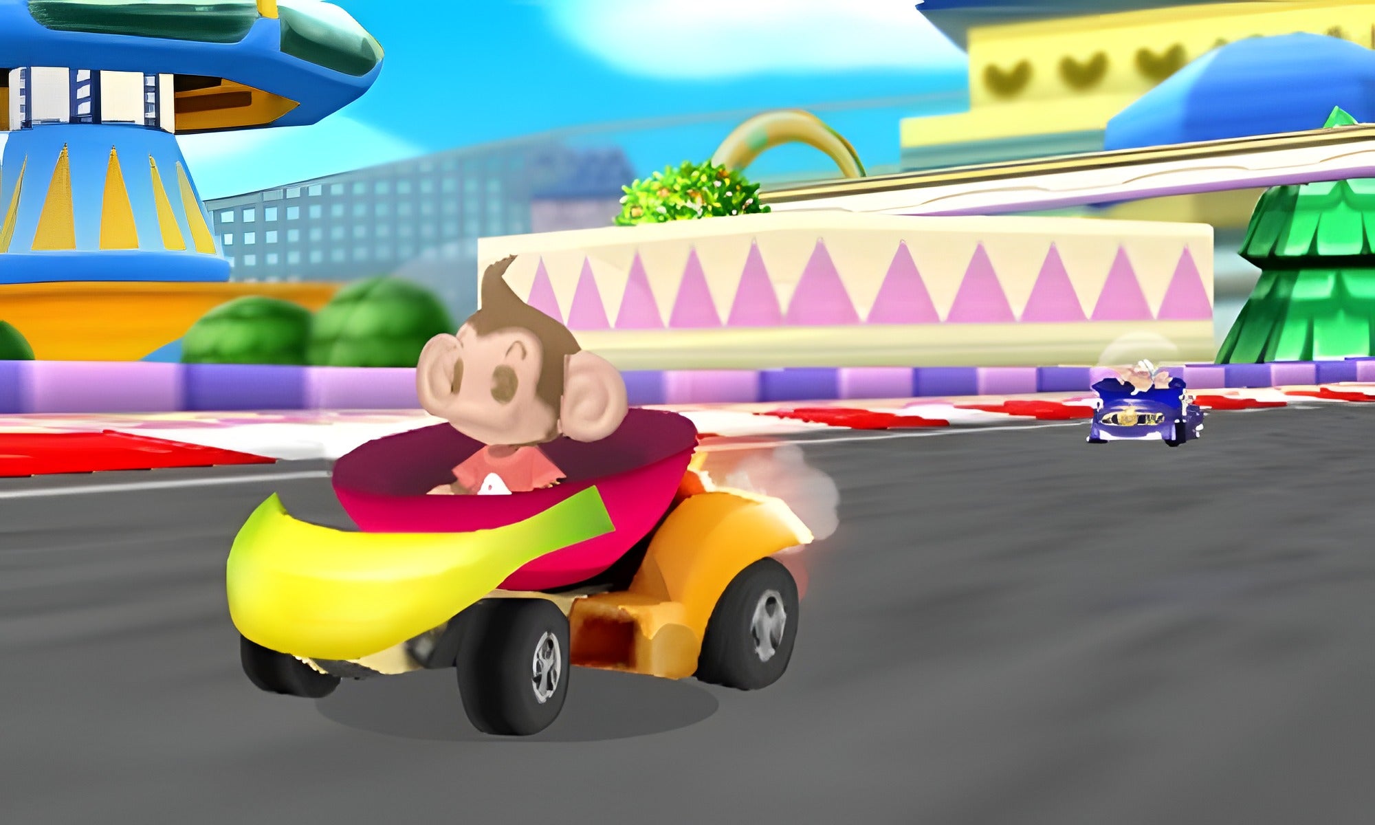 Eine Rennszene aus Super Monkey Ball 3D für Nintendo 3DS zeigt einen Affen in einem Bananenauto auf der Strecke.