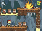 Maxwell steht in einer Höhle mit mehreren Fässern, einem Feuer und spitzen Stacheln.