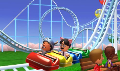 Zwei Mii-Charaktere fahren auf einer Achterbahn, während im Hintergrund eine weitere Bahn und ein Riesenrad zu sehen sind.