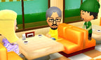 Drei Mii-Charaktere sitzen in Tomodachi Life an einem Tisch in einem Café.