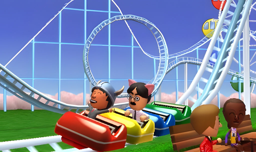 Zwei Mii-Charaktere fahren in Tomodachi Life in einer Achterbahn, weitere Miis sitzen daneben.